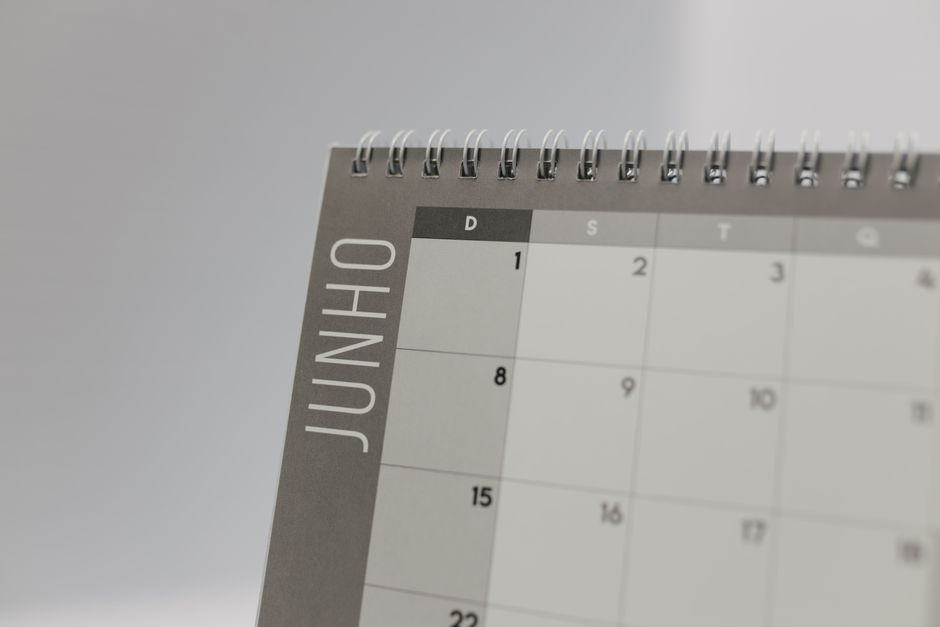 MM2H 居住 天數 — Close-up view of a spiral-bound calendar showing the month o